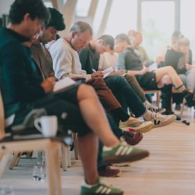 Brainstorming in a circle of chairs.