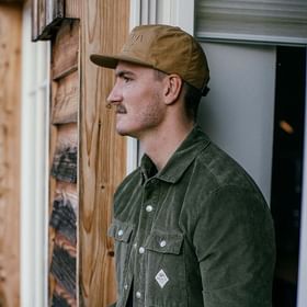 A man dressed in the new maloja winter-collection. 