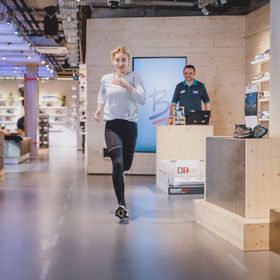 A Person who is running in the store