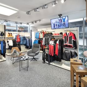 Bründl Sports Saalbach Life.Style - interior view - ski touring outfits and a coffee bar 