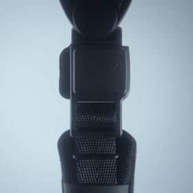Close-up of the buckle on an Atomic Revent helmet.