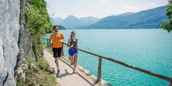 a man and a women are running at Mondsee