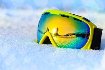 ski goggles in the snow