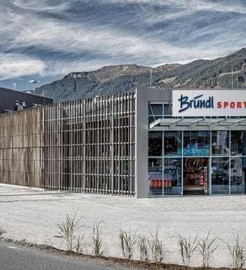 Outer View Bründl Sports Saalfelden with a huge parking space <br/>