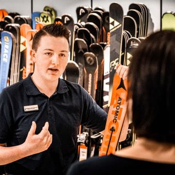 an employee presents a ski