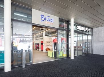 Entrance to the Bründl Sports Shops at the Penkenbahn mountain station in Zillertal