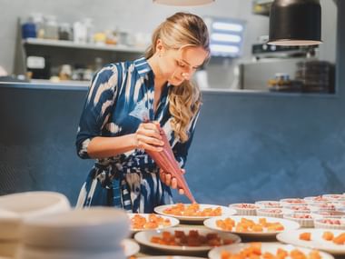 Paula Bründl during cooking 
