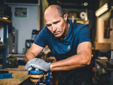 Hans Hofer doing a ski service for racing skis 