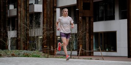 A young woman is jogging