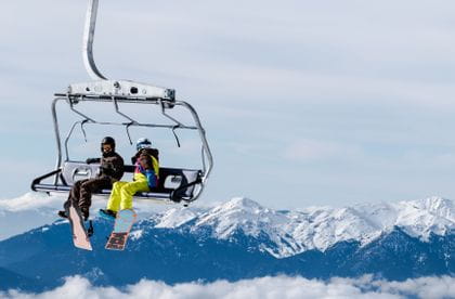 Snowboarder in a Gondola