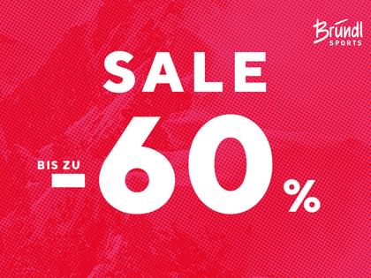 The image features a striking red promotional graphic with bold white text. The central focus is on the word “SALE” in uppercase letters, followed by a large "-60%", indicating a discount of up to 60%. To the left, the words “BIS ZU” (meaning “up to” in German) clarify that this is the maximum discount available. In the top right corner, the “Bründl Sports” logo is visible. The design is simple yet eye-catching, with a textured background that adds a sense of energy.