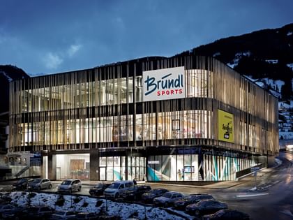 Valley station Spiejochbahn in Fügen with Bründl Sports shop at night