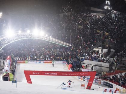 Finish area of Nightrace Schladming with grandstands in the background