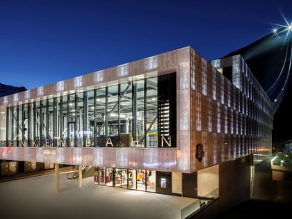 Bründl Sports Penkenbahn Talstation from outside by night <br/>