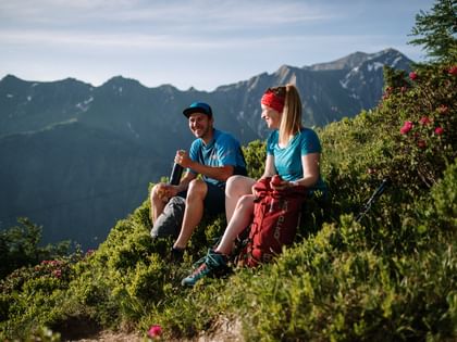 Hikers taking a break and snacking