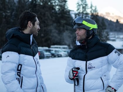 The former ski racer and HEAD brand ambassador Hans Grugger in conversation with another person