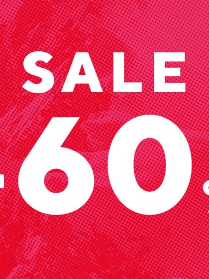 The image features a striking red promotional graphic with bold white text. The central focus is on the word “SALE” in uppercase letters, followed by a large "-60%", indicating a discount of up to 60%. To the left, the words “BIS ZU” (meaning “up to” in German) clarify that this is the maximum discount available. In the top right corner, the “Bründl Sports” logo is visible. The design is simple yet eye-catching, with a textured background that adds a sense of energy.