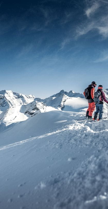 zwei Skifahrer im Tiefschnee auf dem Kitzsteinhorn